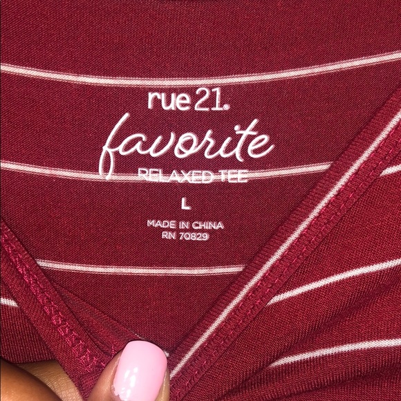 A red & white striped t shirt. - Picture 2 of 2